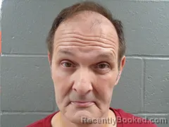 Mugshot of Kirk Johnson booked in Izard County, Arkansas on September 4, 2026