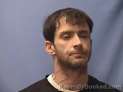 Mugshot of RYAN LOPPE