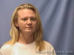 Mugshot of KIMBERLY HUSMAN booked in Logan County, Arkansas on May 7, 2026