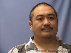 Mugshot of PAO HER booked in Logan County, Arkansas on June 11, 2026