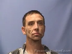 Mugshot of John Harris booked in Logan County, Arkansas on August 23, 2026