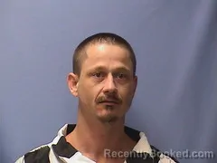 Mugshot of Larry Cowan booked in Logan County, Arkansas on August 23, 2026