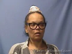 Mugshot of Felicia Hughes booked in Logan County, Arkansas on October 14, 2026