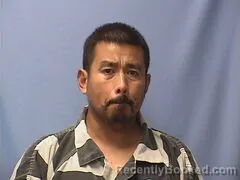 Mugshot of Cruz Guzman booked in Logan County, Arkansas on October 21, 2026