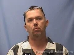 Mugshot of James Cox booked in Logan County, Arkansas on October 21, 2026