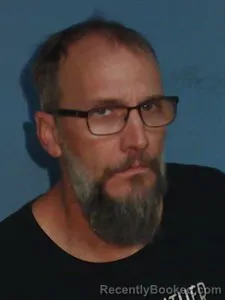 Mugshot of Adam LEWIS REED