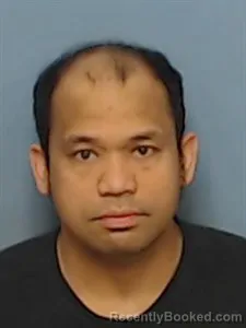 Mugshot of Christopher Aglibot Delrosario