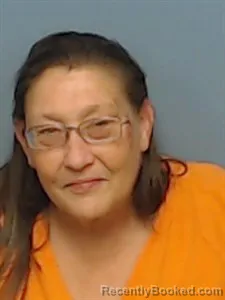 Mugshot of Brenda Arline Coffey booked in Madison County, Arkansas on April 18, 2026
