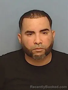 Mugshot of Carlos Manuel Serranopagan booked in Madison County, Arkansas on May 5, 2026