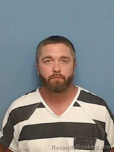 Mugshot of Justin Dwayne Lambdin booked in Madison County, Arkansas on May 27, 2026