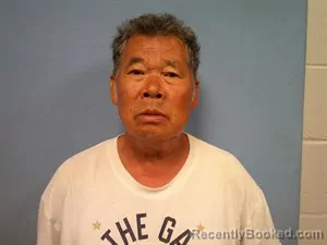 Mugshot of Maniphonh Jay Lasdavanh booked in Madison County, Arkansas on July 11, 2026