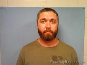 Mugshot of Justin Dwayne Lambdin booked in Madison County, Arkansas on July 22, 2026