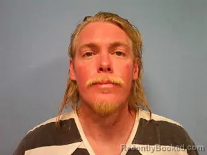 Mugshot of Marcus Randall Dungan booked in Madison County, Arkansas on July 27, 2026