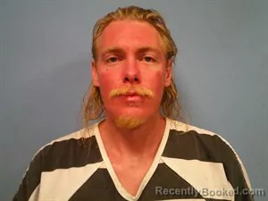 Mugshot of Marcus Randall Dungan booked in Madison County, Arkansas on August 17, 2026