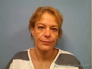 Mugshot of Krystle Marie Ellenbarger booked in Madison County, Arkansas on August 21, 2026