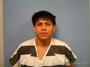 Mugshot of Carlos Alberto Dionicio-Elias booked in Madison County, Arkansas on August 29, 2026