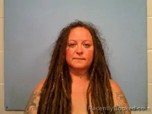 Mugshot of Stardust Arianna Pennell booked in Madison County, Arkansas on October 4, 2026