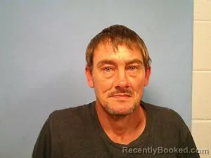 Mugshot of Delbert Raymond Olson booked in Madison County, Arkansas on October 16, 2026