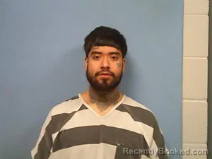 Mugshot of Jose Francico Flores booked in Madison County, Arkansas on October 21, 2026