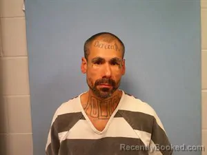 Mugshot of Carlitos Alberto Ramirez booked in Madison County, Arkansas on October 22, 2026