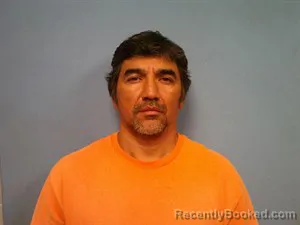 Mugshot of Juan Araujo-Flores booked in Madison County, Arkansas on October 27, 2026