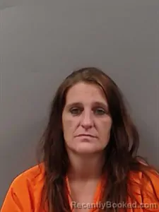 Mugshot of Crystal Lee Caster booked in Marion County, Arkansas on August 15, 2026