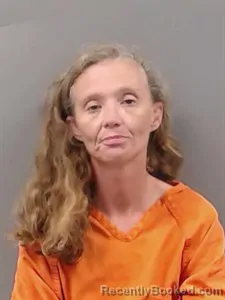 Mugshot of Reba Diane Miller booked in Marion County, Arkansas on August 28, 2026