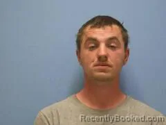 Mugshot of JUSTIN E BROUGHMAN