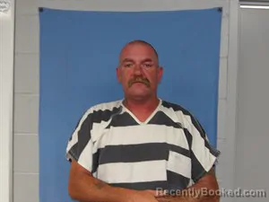 Mugshot of Joshua Thomas Warren booked in Newton County, Arkansas on July 14, 2026