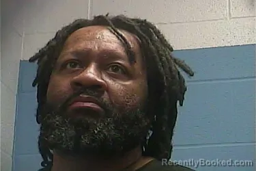 Mugshot of TRAVIS J JARRETT