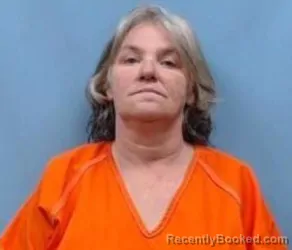 Mugshot of TREASA LYNN DIXSON booked in Pike County, Arkansas on May 11, 2026