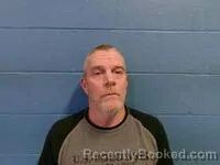 Mugshot of JOHN W POAG