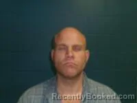 Mugshot of JONATHAN W MOORE