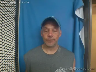 Mugshot of TODD A LADD booked in Polk County, Arkansas on April 15, 2026