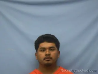 Mugshot of JOHN NMI DIAZ-PASTRANA booked in Pope County, Arkansas on April 10, 2026