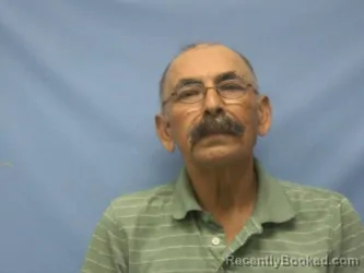 Mugshot of JUAN DEDIOS DE LA ROSA booked in Pope County, Arkansas on May 12, 2026