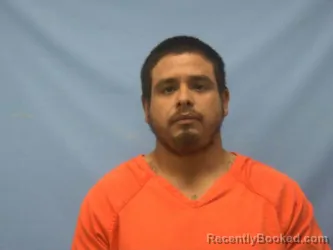 Mugshot of LUIS RUBEN JR FLORES booked in Pope County, Arkansas on May 12, 2026