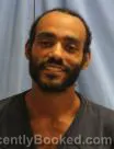 Mugshot of Adrian Wendell Moore booked in Pulaski County, Arkansas on August 8, 2026