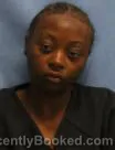 Mugshot of TIAJA WOODARD booked in Pulaski County, Arkansas on July 7, 2026