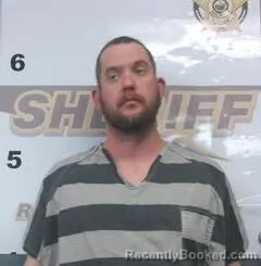 Mugshot of GARRETT THROESCH