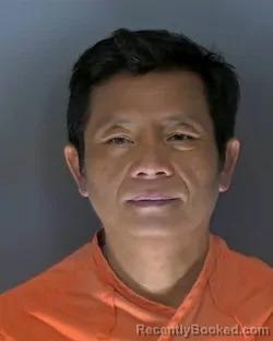 Mugshot of Quy Van Tran booked in Horry County, South Carolina on August 12, 2026