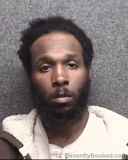 Mugshot of DEWON TYQUIL HUGGINS