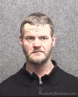 Mugshot of DUSTIN LANE MUMFORD