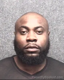 Mugshot of DINGGANA MBOH NTUNDI