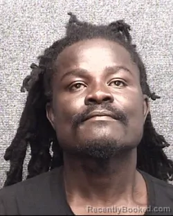 Mugshot of KOJO AMKONH booked in Horry County, South Carolina on May 17, 2026