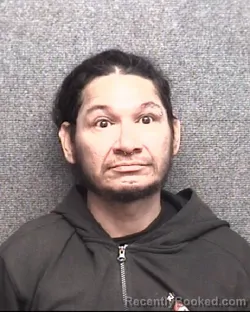 Mugshot of REYMUNDO ANGUIANO