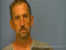 Mugshot of Justin Adams booked in Saline County, Arkansas on September 23, 2026