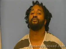 Mugshot of JUSTIN HOLMES booked in Saline County, Arkansas on June 16, 2026