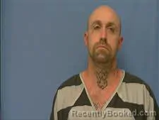 Mugshot of Adam Belcher booked in Saline County, Arkansas on August 23, 2026