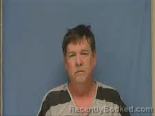 Mugshot of MICHAEL MAGNESS booked in Saline County, Arkansas on May 18, 2026